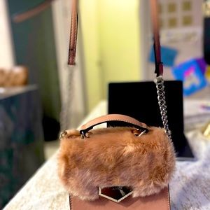 Pink aldo  faux fur purse.                  Used condition